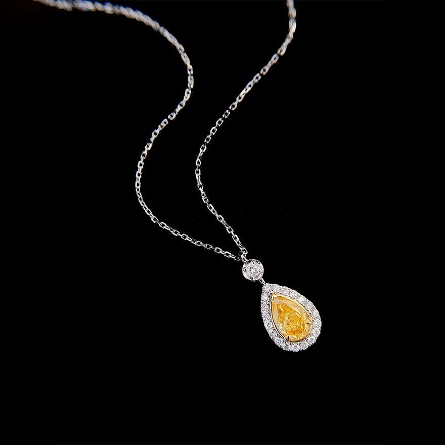 14k Gold 0.94 Ctw Natural Yellow Diamond & Diamond Pendant( Without Chain ): Ref:230980013 // gold content:14k gold // main gemstone:yellow diamond // shape:pear // carat weight:0. 7ct // color:yellow // treatment:natural // // adjacent gemstone 2 : diamond // shape:round //