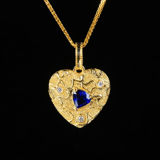 14k Gold 0.36 Ctw Natural Sapphire & Diamond Pendant( Without Chain ): Ref:230980020 // gold content:14k gold // main gemstone:sapphire // shape:pear // carat weight:0. 33ct // color:blue // treatment:natural // // adjacent gemstone 2 : diamond // number of stones:3 //