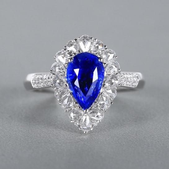14k Gold 2.54 Ctw Natural Sapphire & Diamond Ring: Ref:230980023 // gold content:14k gold // ring size:7. 25us // // main gemstone:sapphire // shape:pear // carat weight:2. 03ct // color:royal blue // treatment:natural // // adjacent gemstone 2 :