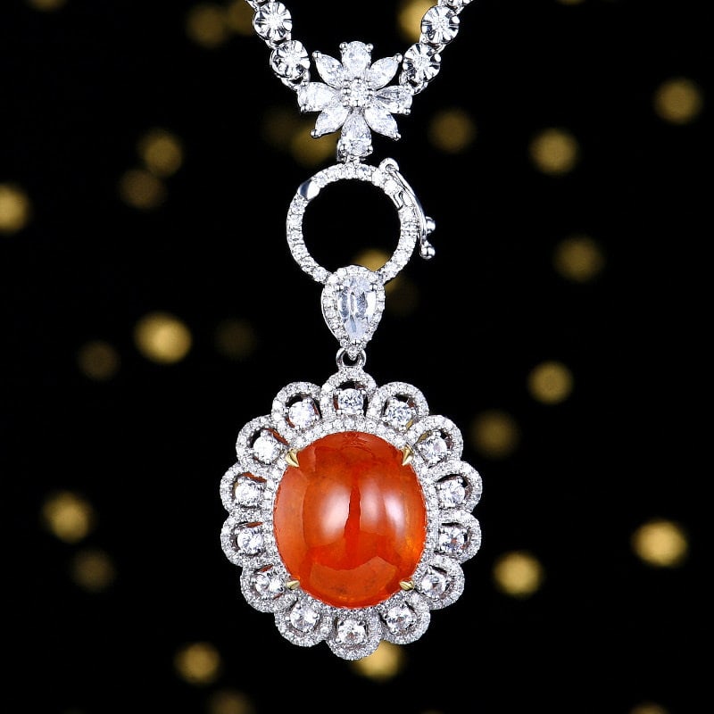 14k Gold 11.24 Ctw Natural Spessartine & Diamond Pendant( Without Chain ): Ref:230980036 // gold content:14k gold // main gemstone:spessartine // shape:oval // carat weight:10. 8ct // color:orange // treatment:natural // // adjacent gemstone 2 : diamond // number of