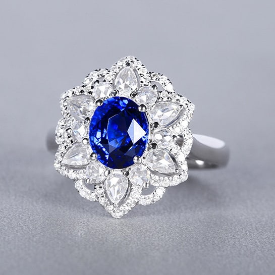 14k Gold 2.59 Ctw Natural Sapphire & Diamond Ring: Ref:230980041 // gold content:14k gold // ring size:7. 25us // // main gemstone:sapphire // shape:oval // carat weight:2. 03ct // color:royal blue // treatment:natural // // adjacent gemstone 2 :