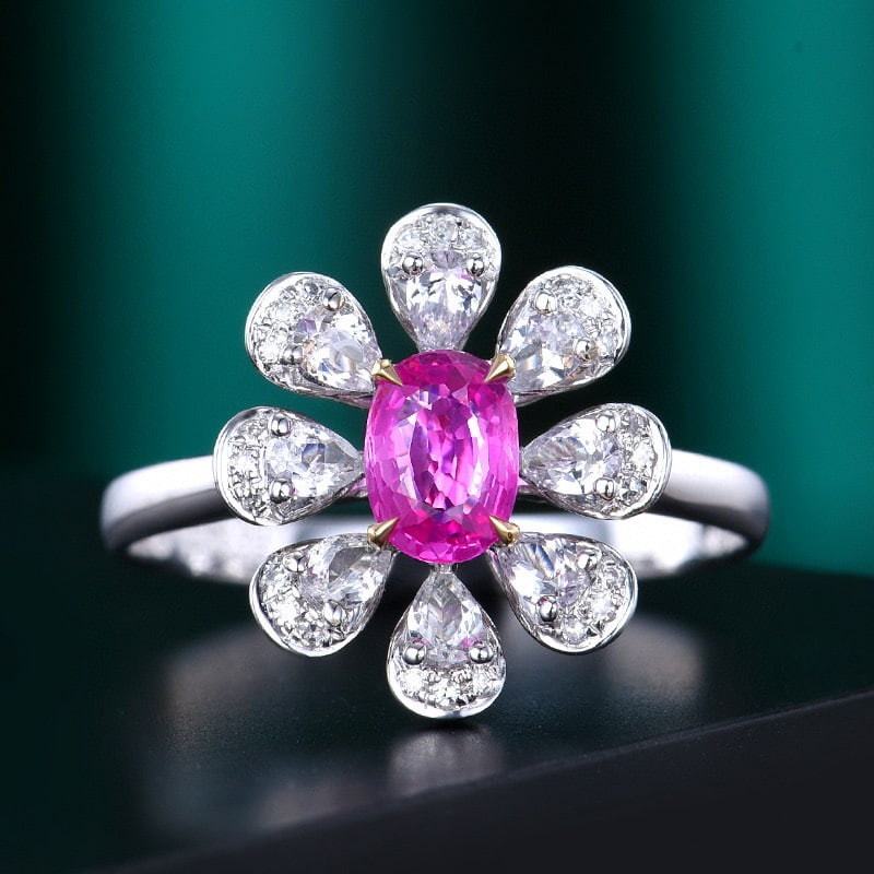 14k Gold 0.63 Ctw Natural Padparadscha Sapphire & Diamond Ring: Ref:230980069 // gold content:14k gold // ring size:7. 25us // // main gemstone:padparadscha sapphire // shape:oval // carat weight:0. 57ct // color:orangish pink // treatment:natural // // adjacent
