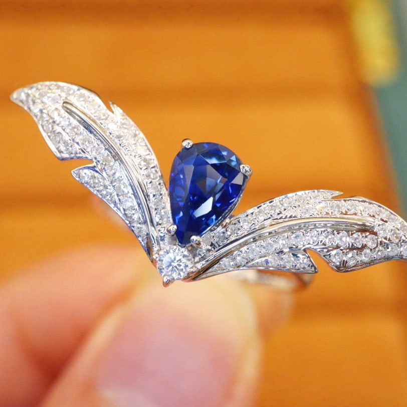 14k Gold 1.47 Ctw Natural Sapphire & Diamond Ring: Ref:230980130 // gold content:14k gold // ring size:7. 25us // // main gemstone:sapphire // shape:pear // carat weight:1. 18ct // color:royal blue // treatment:natural // // adjacent gemstone 2 :