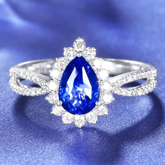 14k Gold 1.43 Ctw Natural Sapphire & Diamond Ring: Ref:230980159 // gold content:14k gold // ring size:7. 25us // // main gemstone:sapphire // shape:pear // carat weight:1. 07ct // color:cornflower blue // treatment:natural // // adjacent gemstone 2