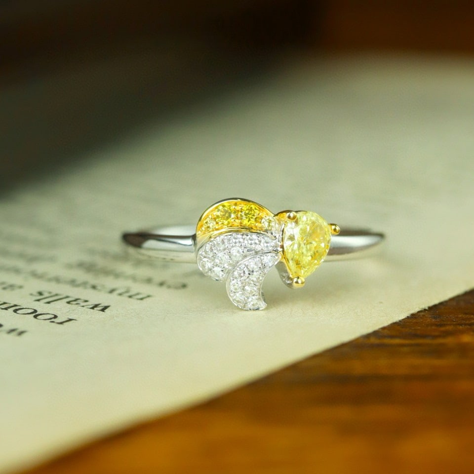 14k Gold 0.32 Ctw Natural Yellow Diamond & Diamond Ring: Ref:230980198 // gold content:14k gold // ring size:7. 25us // // main gemstone:yellow diamond // shape:pear // carat weight:0. 22ct // color:yellow // treatment:natural // // adjacent gemstone 2 :