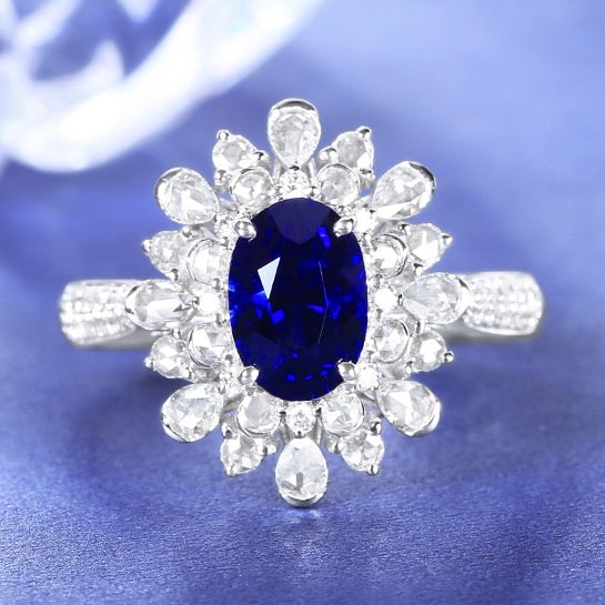 14k Gold 2.57 Ctw Natural Sapphire & Diamond Ring: Ref:230980208 // gold content:14k gold // ring size:7. 25us // // main gemstone:sapphire // shape:oval // carat weight:2. 06ct // color:royal blue // treatment:natural // // adjacent gemstone 2 :