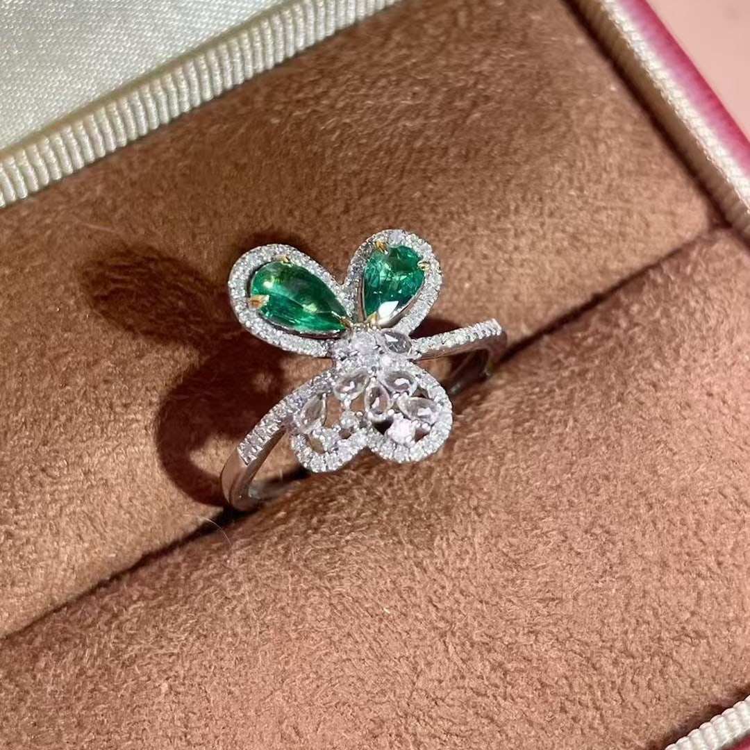 14k Gold 0.5 Ct Natural Emerald & Diamond Ring: Ref:230980219 // gold content:14k gold // ring size:7. 25us // // main gemstone:emerald // shape:pear // carat weight:0. 5ct // color:green // treatment:natural // // adjacent gemstone 2 : diamond //