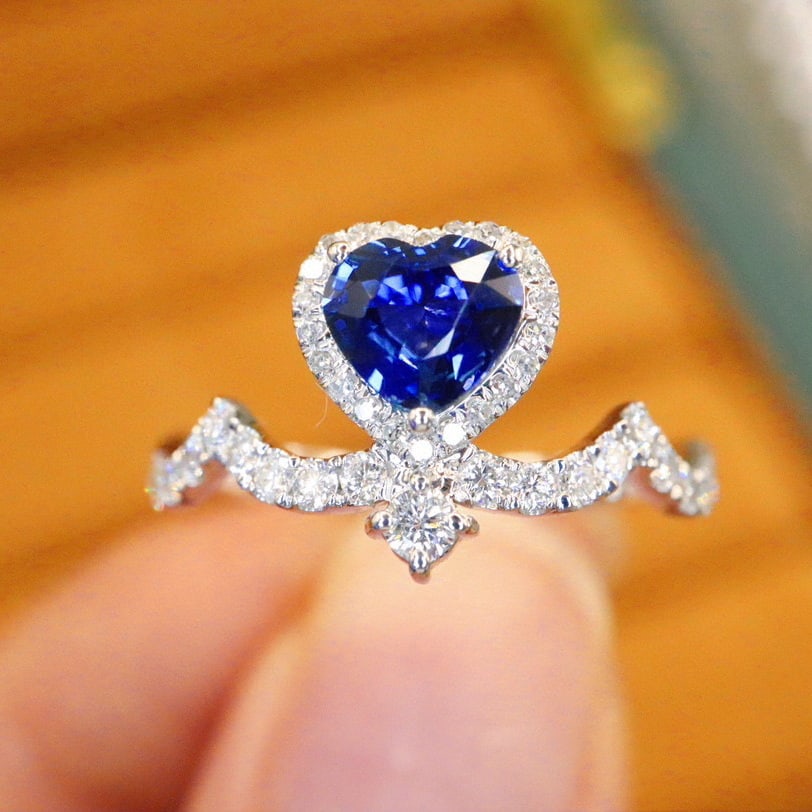 14k Gold 0.94 Ctw Natural Sapphire & Diamond Ring: Ref:230980233 // gold content:14k gold // ring size:7. 25us // // main gemstone:sapphire // shape:heart // carat weight:0. 62ct // color:royal blue // treatment:natural // // adjacent gemstone 2 :