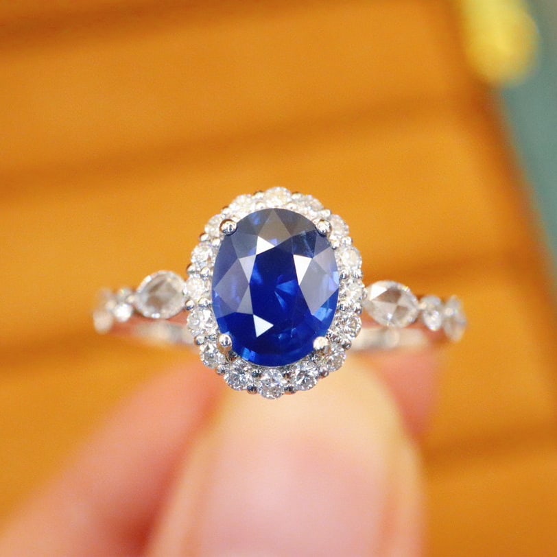 14k Gold 1.39 Ctw Natural Sapphire & Diamond Ring: Ref:230980270 // gold content:14k gold // ring size:7. 25us // // main gemstone:sapphire // shape:oval // carat weight:1. 01ct // color:royal blue // treatment:natural // // adjacent gemstone 2 :