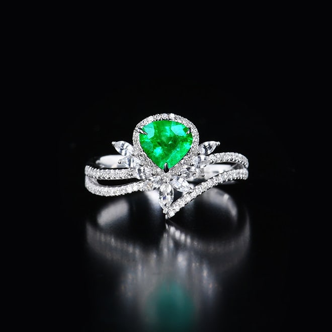 14k Gold 0.83 Ctw Vivid Green Natural Emerald & Diamond Ring: Ref:230980271 // gold content:14k gold // ring size:7. 25us // // main gemstone:emerald // shape:pear // carat weight:0. 63ct // color:vivid green // treatment:natural // // adjacent gemstone 2 :