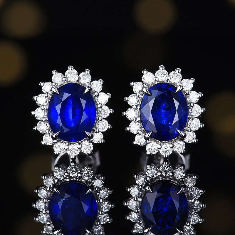 14k Gold 1.56 Ctw Natural Sapphire & Diamond Earrings: Ref:230980280 // gold content:14k gold // main gemstone:sapphire // shape:oval // carat weight:1. 24ct // color:royal blue // treatment:natural // // adjacent gemstone 2 : diamond // number of stones: