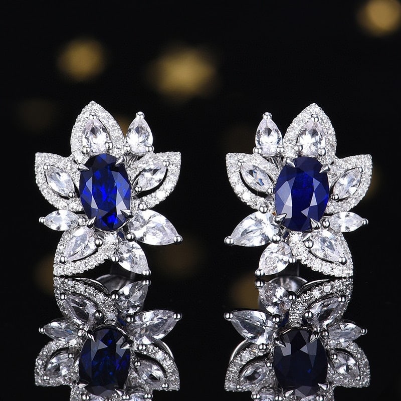 14k Gold 1.23 Ctw Natural Sapphire & Diamond Earrings: Ref:230980287 // gold content:14k gold // main gemstone:sapphire // shape:oval // carat weight:1. 02ct // color:royal blue // treatment:natural // // adjacent gemstone 2 : diamond // number of stones: