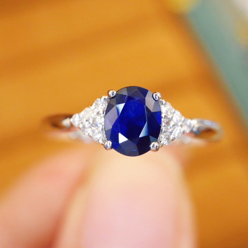14k Gold 0.92 Ctw Natural Sapphire & Diamond Ring: Ref:230980318 // gold content:14k gold // ring size:7. 25us // // main gemstone:sapphire // shape:oval // carat weight:0. 83ct // color:royal blue // treatment:natural // // adjacent gemstone 2 :