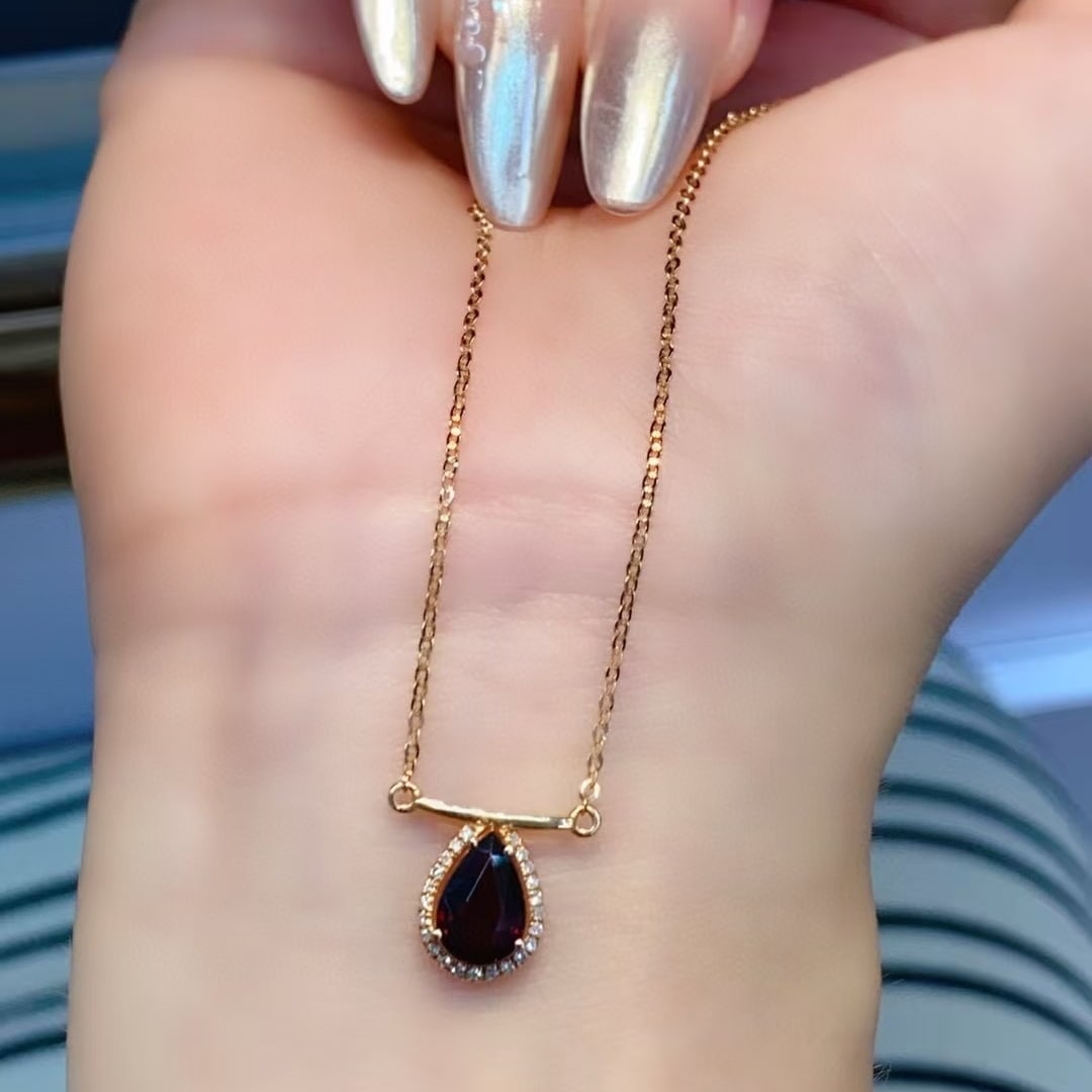 14k Gold 0.77 Ctw Natural Tourmaline & Diamond Necklace: Ref:230980342 // gold content:14k gold // main gemstone:tourmaline // shape:pear // carat weight:0. 7ct // color:red // treatment:natural // // adjacent gemstone 2 : diamond // number of stones:23 //