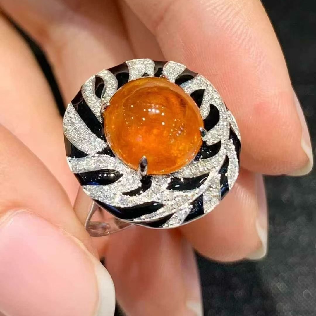 14k Gold 6.8 Ct Natural Spessartine & Diamond Ring: Ref:230980345 // gold content:14k gold // ring size:7. 25us // // main gemstone:spessartine // shape:oval // carat weight:6. 8ct // color:orange // treatment:natural // // adjacent gemstone 2 :