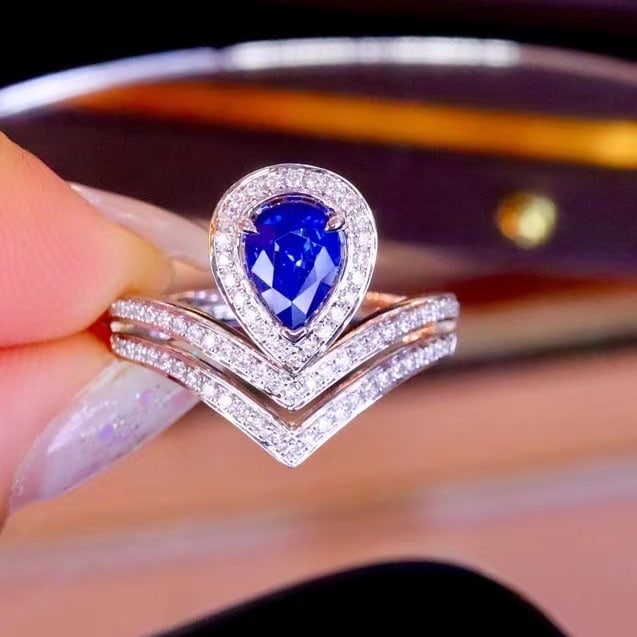 14k Gold 1.22 Ctw Natural Sapphire & Diamond Ring: Ref:230980380 // gold content:14k gold // ring size:7. 25us // // main gemstone:sapphire // shape:pear // carat weight:0. 90ct // color:royal blue // treatment:natural // // adjacent gemstone 2 :