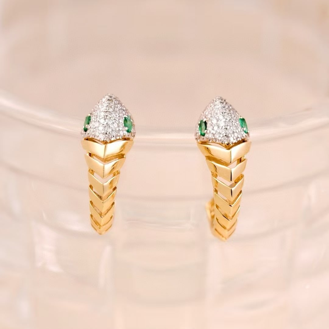 14k Gold 0.84 Ctw Natural Emerald & Diamond Earrings: Ref:230980393 // gold content:14k gold // main gemstone:emerald // shape:marquise // carat weight:0. 14ct // color:green // treatment:natural // // adjacent gemstone 2 : diamond // shape:round //