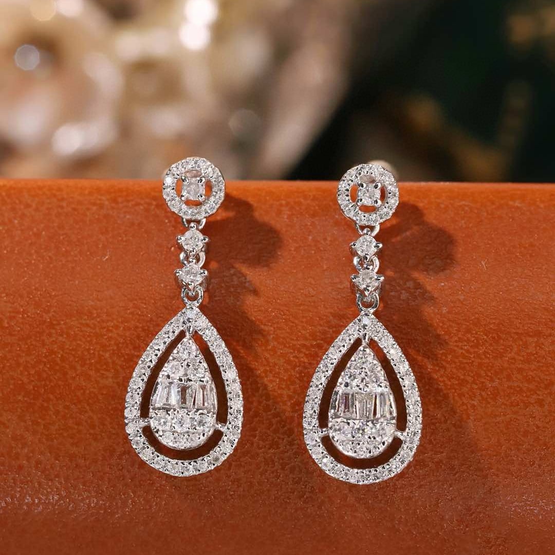 14k Gold 0.50 Ct Natural H Diamond Earrings: Ref:231147048 // gold content:14k gold // main gemstone:diamond // shape:multiple // carat weight:0. 50ct // clarity grade:vs-si // color:h // treatment:natural // Condition: New Low Estimate: