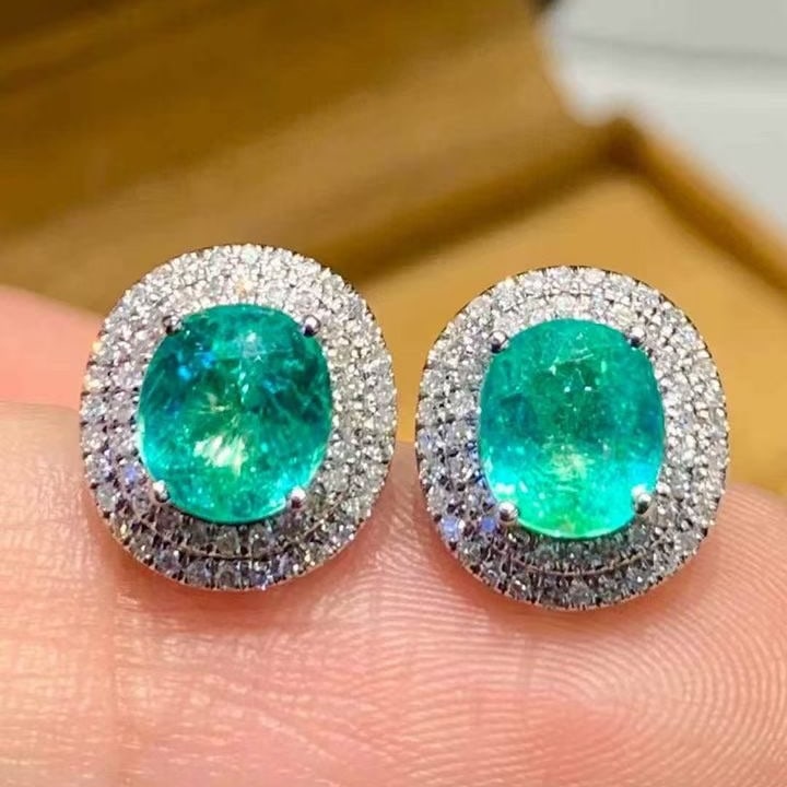 14k Gold 1.88 Ct Natural Paraiba Tourmaline & Diamond Earrings: Ref:231147059 // gold content:14k gold // main gemstone:paraiba tourmaline // shape:oval // carat weight:1. 88ct // color:bluish green // treatment:natural // // adjacent gemstone 2 : diamond // shape