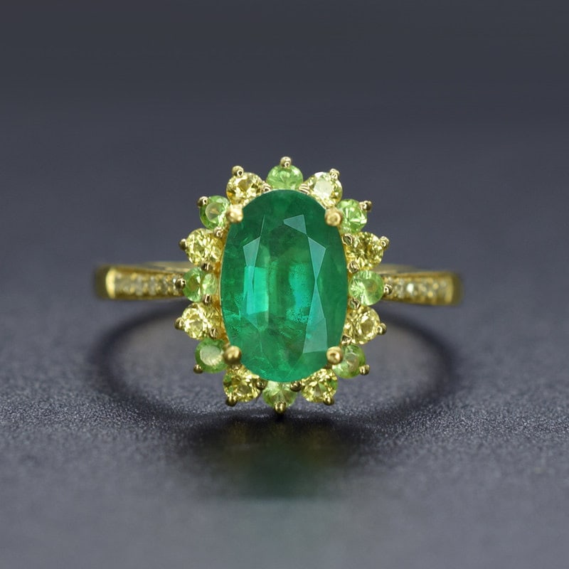 14k Gold 1.47 Ctw Natural Emerald & Sapphire Ring: Ref:231147083 // gold content:14k gold // ring size:7. 25us // // main gemstone:emerald // shape:oval // carat weight:1. 31ct // color:green // treatment:natural // // adjacent gemstone 2 : sapphire