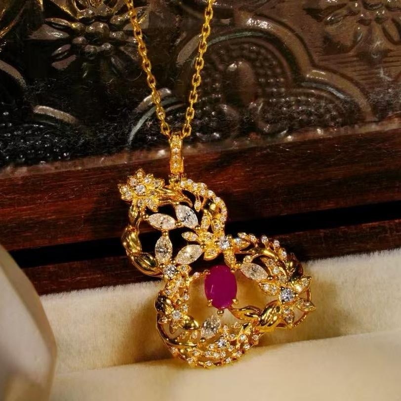 14k Gold 1.28 Ctw Natural Ruby & Diamond Necklace: Ref:231147093 // gold content:14k gold // main gemstone:ruby // shape:oval // carat weight:0. 52ct // color:red // treatment:natural // // adjacent gemstone 2 : diamond // shape:multiple // carat