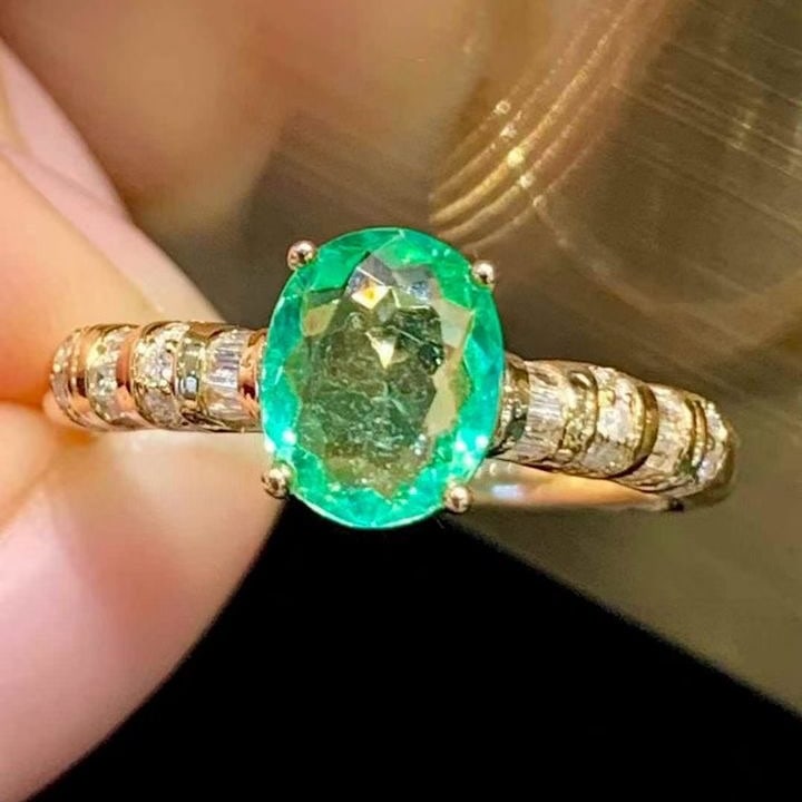 14k Gold 1.02 Ct Natural Paraiba Tourmaline & Diamond Ring: Ref:231147108 // gold content:14k gold // ring size:7. 25us // // main gemstone:paraiba tourmaline // shape:oval // carat weight:1. 02ct // color:bluish green // treatment:natural // // adjacent