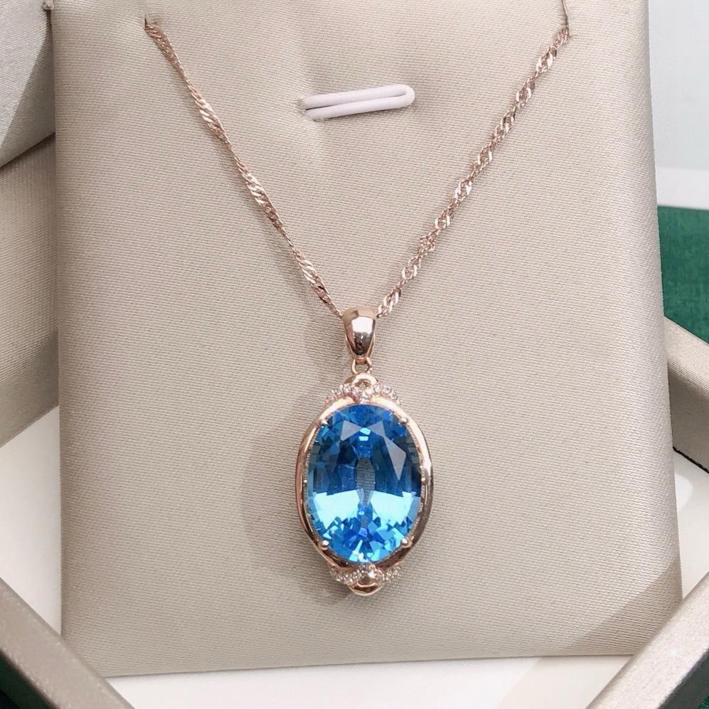 14k Gold 9.75 Ctw Natural Topaz & Diamond Pendant( Without Chain ): Ref:231147241 // gold content:14k gold // main gemstone:topaz // shape:oval // carat weight:9. 7ct // color:blue // treatment:natural // // adjacent gemstone 2 : diamond // number of stones:18 //