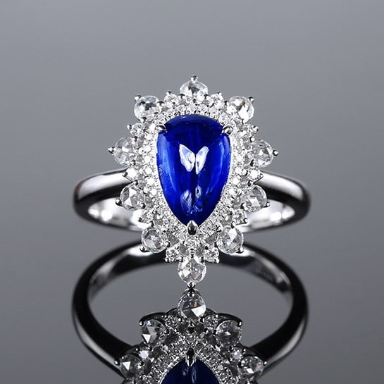 14k Gold 2.46 Ctw Vivid Blue Natural Sapphire & Diamond Ring: Ref:231148013 // gold content:14k gold // ring size:7. 25us // // main gemstone:sapphire // shape:pear // carat weight:2. 01ct // color:vivid blue // treatment:natural // // adjacent gemstone 2 : diam