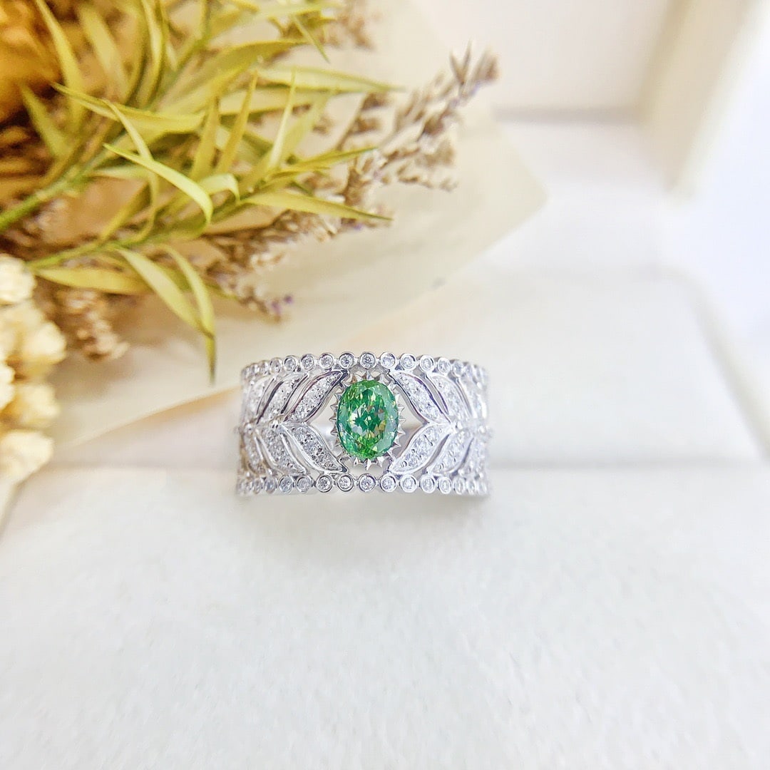 14k Gold 0.95 Ctw Natural Green Diamond & Diamond Ring: Ref:231148232 // gold content:14k gold // ring size:7. 25us // // main gemstone:green diamond // shape:oval // carat weight:0. 53ct // color:green // treatment:natural // // adjacent gemstone 2 :