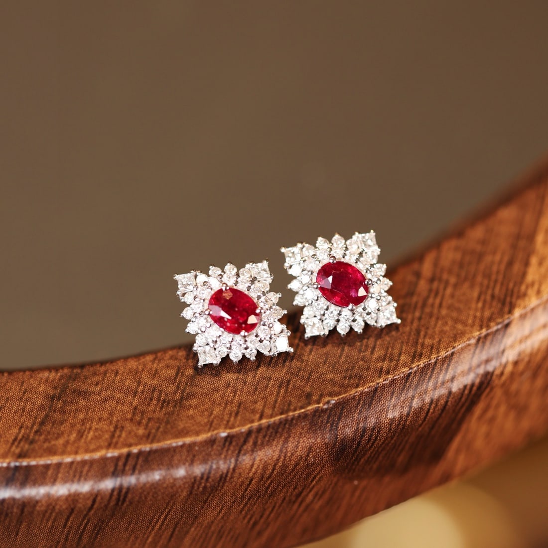 14k Gold 1.30 Ctw Natural Ruby & Diamond Earrings: Ref:231148331 // gold content:14k gold // main gemstone:ruby // shape:oval // carat weight:0. 75ct // color:red // treatment:natural // // adjacent gemstone 2 : diamond // shape:multiple // carat weig