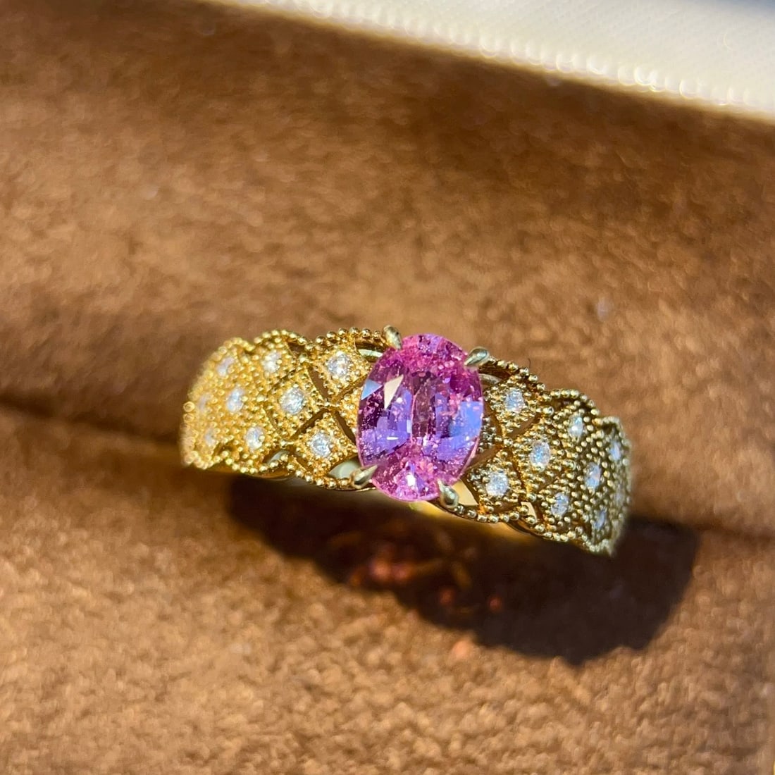 14k Gold 1.08 Ctw Natural Padparadscha Sapphire & Diamond Ring: Ref:231148339 // gold content:14k gold // ring size:7. 25us // // main gemstone:padparadscha sapphire // shape:oval // carat weight:0. 97ct // color:orangish pink // treatment:natural // // adjacent