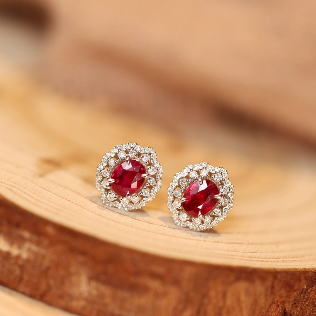 14k Gold 1.24 Ctw Natural Ruby & Diamond Earrings: Ref:231148379 // gold content:14k gold // main gemstone:ruby // shape:oval // carat weight:0. 7ct // color:red // treatment:natural // // adjacent gemstone 2 : diamond // shape:round // carat