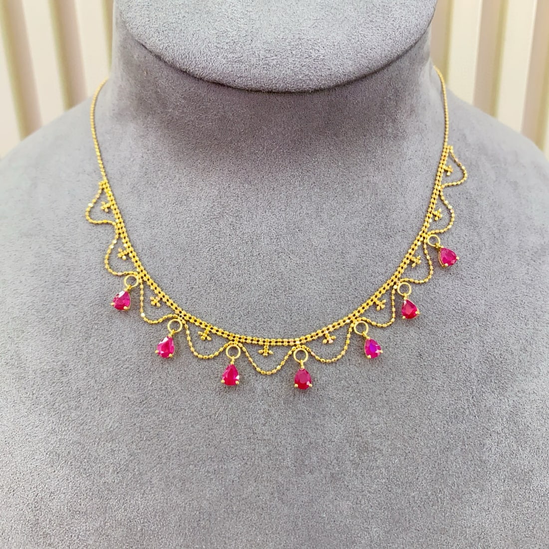 14k Gold 2.8 Ct Natural Ruby Necklace: Ref:231149082 // gold content:14k gold // main gemstone:ruby // number of stones:7 // shape:pear // carat weight:2. 8ct // color:red // treatment:natural // Condition: New Low Estimate: 5500.00 High E