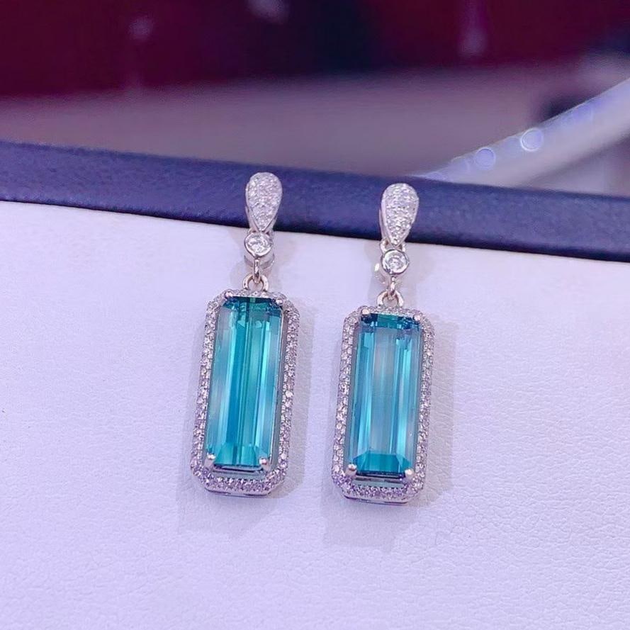 14k Gold 4.2 Ct Natural Tourmaline & Diamond Earrings: Ref:231149105 // gold content:14k gold // main gemstone:tourmaline // shape:octagonal // carat weight:4. 2ct // color:blue // treatment:natural // // adjacent gemstone 2 : diamond // shape:round // cl