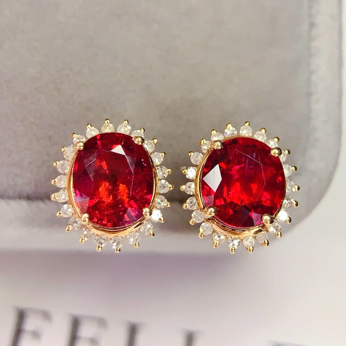14k Gold 3.8 Ct Natural Tourmaline & Diamond Earrings: Ref:231149110 // gold content:14k gold // main gemstone:tourmaline // shape:oval // carat weight:3. 8ct // color:red // treatment:natural // // adjacent gemstone 2 : diamond // number of stones:44 // 