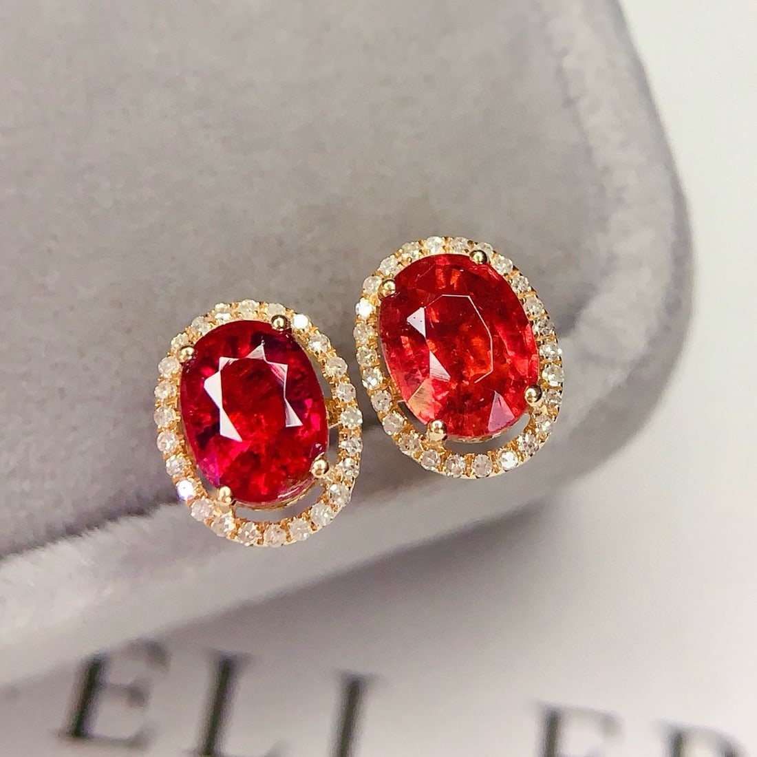 14k Gold 4.00 Ct Natural Tourmaline & Diamond Earrings: Ref:231149158 // gold content:14k gold // main gemstone:tourmaline // shape:oval // carat weight:4. 00ct // color:red // treatment:natural // // adjacent gemstone 2 : diamond // number of stones:51 //