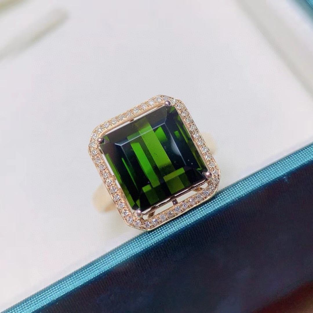 14k Gold 8.18 Ctw Natural Tourmaline & Diamond Ring: Ref:231149200 // gold content:14k gold // ring size:7. 25us // // main gemstone:tourmaline // shape:octagonal // carat weight:8. 05ct // color:green // treatment:natural // // adjacent gemstone 2 : di