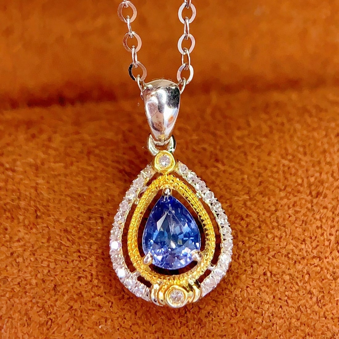 14k Gold 0.5 Ct Natural Sapphire & Diamond Pendant( Without Chain ): Ref:231149224 // gold content:14k gold // main gemstone:sapphire // shape:pear // carat weight:0. 5ct // color:blue // treatment:natural // // adjacent gemstone 2 : diamond // number of stones:26 // s