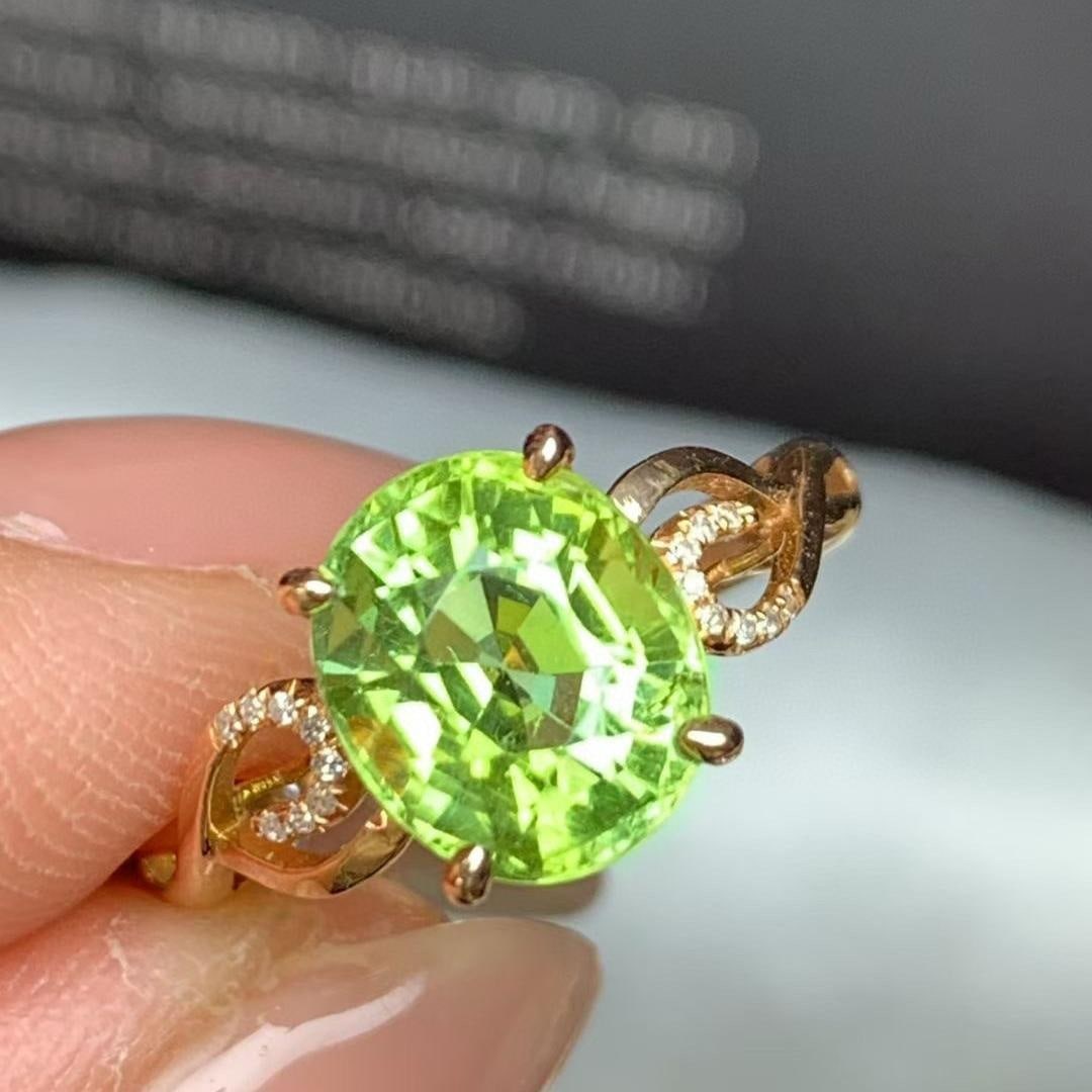 14k Gold 3.2 Ct Natural Tourmaline & Diamond Ring: Ref:231149248 // gold content:14k gold // ring size:7. 25us // // main gemstone:tourmaline // shape:oval // carat weight:3. 2ct // color:green // treatment:natural // // adjacent gemstone 2 : diamond