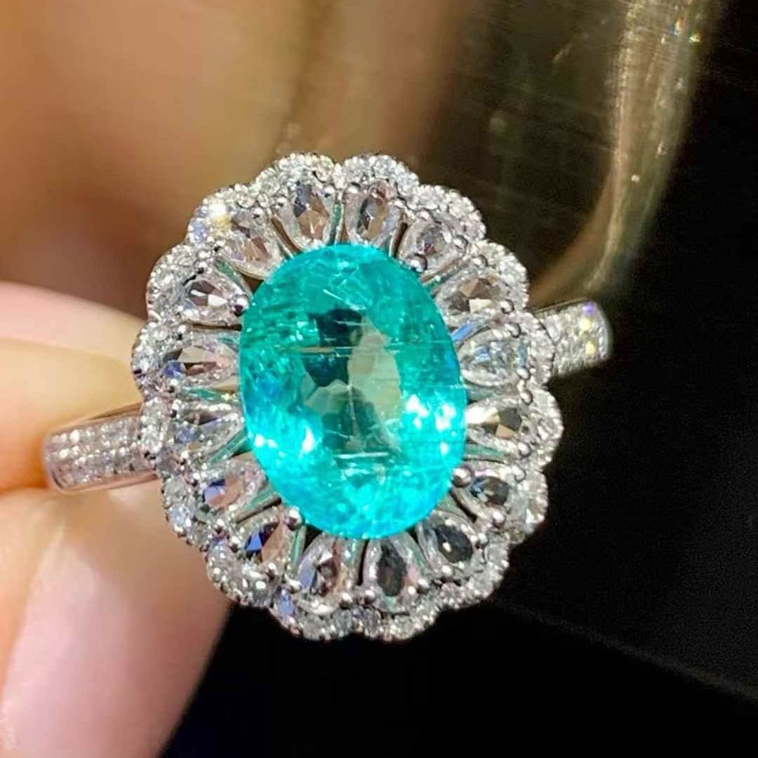 14k Gold 1.8 Ct Natural Paraiba Tourmaline & Diamond & Sapphire Ring: Ref:231149249 // gold content:14k gold // ring size:7. 25us // // main gemstone:paraiba tourmaline // shape:oval // carat weight:1. 8ct // color:blue // treatment:natural // // adjacent gemstone 2 :