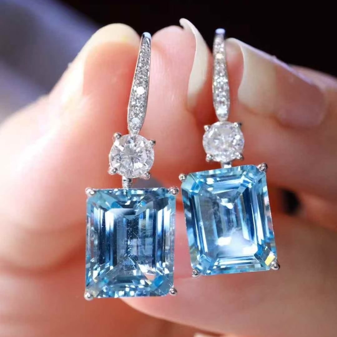 14k Gold 7.11 Ctw Natural Aquamarine & Diamond Earrings: Ref:231149252 // gold content:14k gold // main gemstone:aquamarine // shape:octagonal // carat weight:6. 47ct // color:blue // treatment:natural // // adjacent gemstone 2 : diamond // shape:round // c