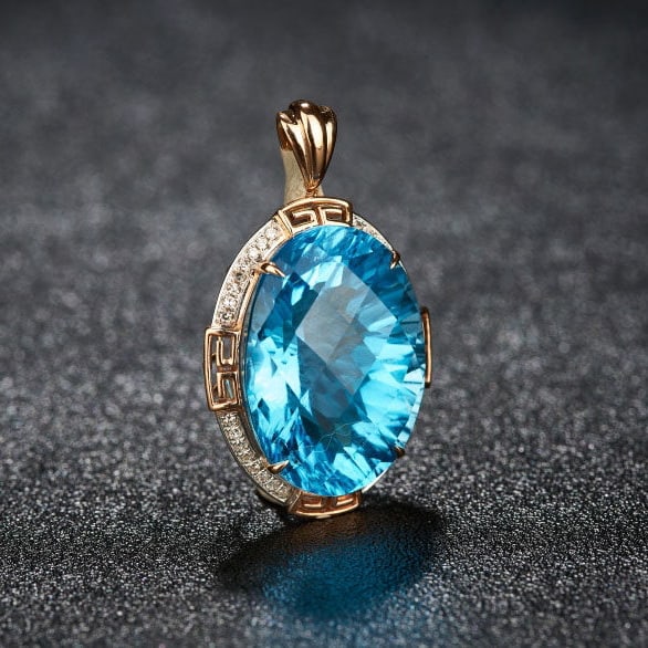 14k Gold 18.52 Ct Natural Topaz & Diamond Pendant( Without Chain ): Ref:231150009 // gold content:14k gold // main gemstone:topaz // shape:oval // carat weight:18. 52ct // color:blue // treatment:natural // // adjacent gemstone 2 : diamond // number of stones:32 //