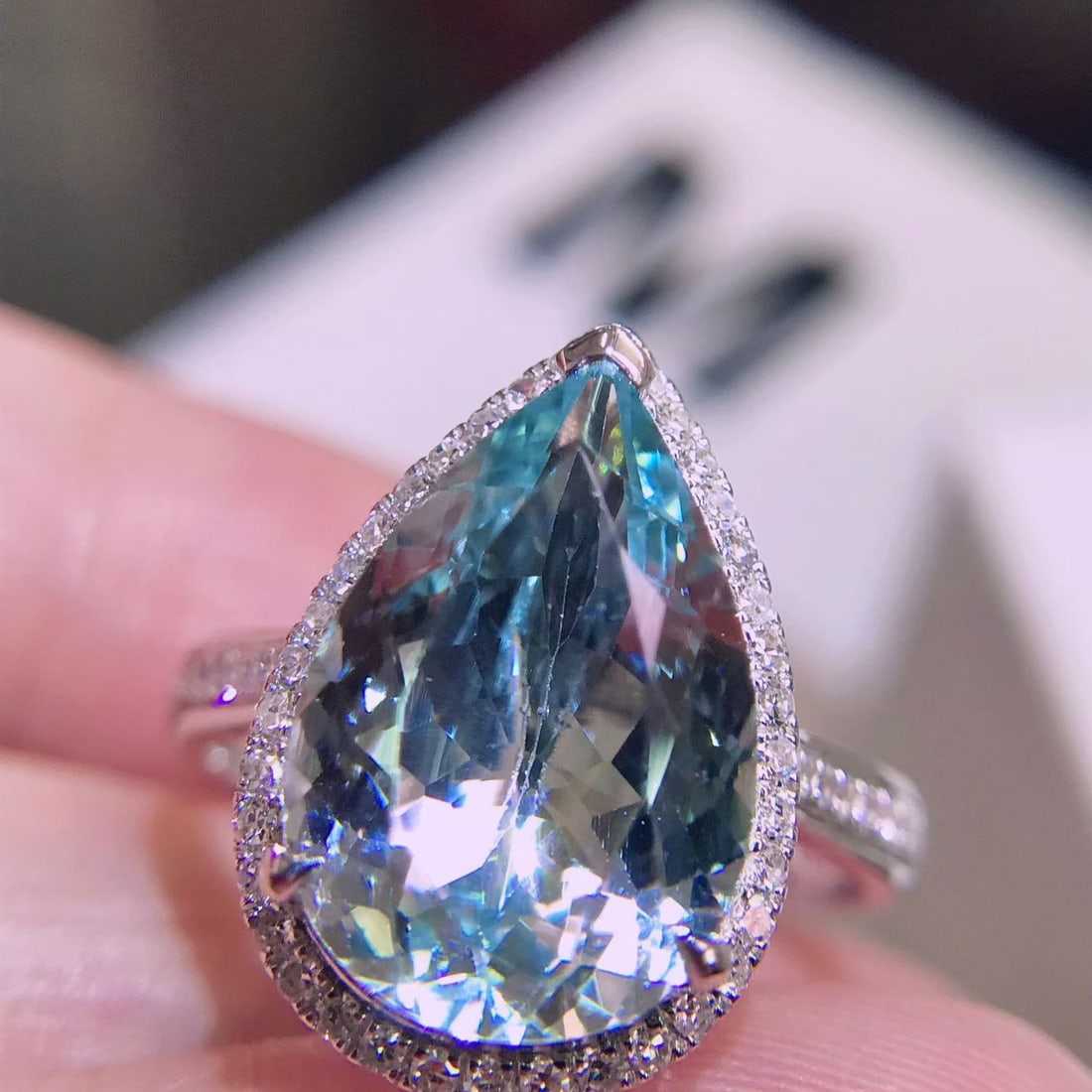 14k Gold 4.11 Ctw Natural Aquamarine & Diamond Ring: Ref:231150180 // gold content:14k gold // ring size:7. 25us // // main gemstone:aquamarine // shape:pear // carat weight:3. 8ct // color:blue // treatment:natural // // adjacent gemstone 2 : diamond