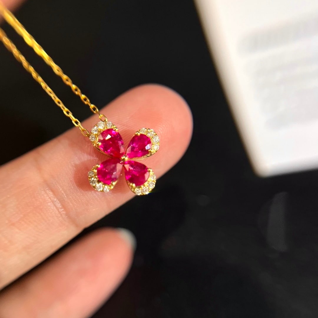 14k Gold 1.04 Ctw Natural Ruby & Diamond Necklace: Ref:231150188 // gold content:14k gold // main gemstone:ruby // shape:pear // carat weight:0. 98ct // color:red // treatment:natural // // adjacent gemstone 2 : diamond // shape:round // carat weight: