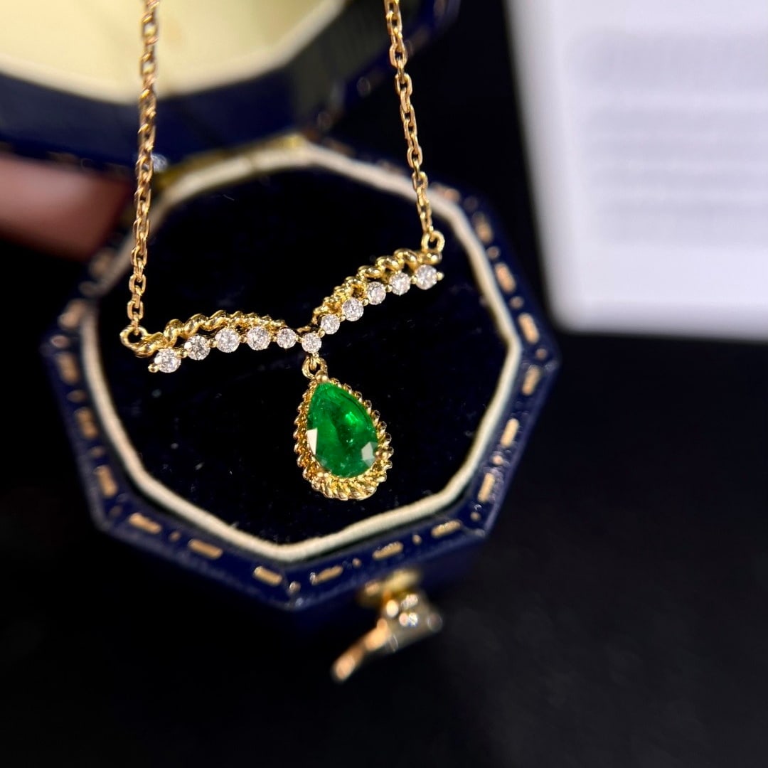 14k Gold 0.47 Ctw Vivid Green Natural Emerald & Diamond Necklace: Ref:231150197 // gold content:14k gold // main gemstone:emerald // shape:pear // carat weight:0. 38ct // color:vivid green // treatment:natural // // adjacent gemstone 2 : diamond // shape:round //