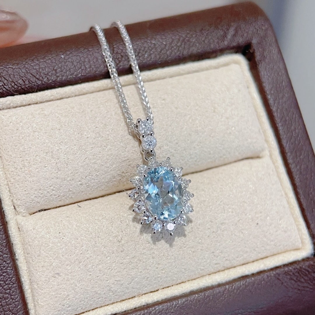 14k Gold 1.30 Ctw Natural Aquamarine & Diamond Pendant( Without Chain ): Ref:231150213 // gold content:14k gold // main gemstone:aquamarine // shape:oval // carat weight:0. 85ct // color:blue // treatment:natural // // adjacent gemstone 2 : diamond // shape:round // carat 