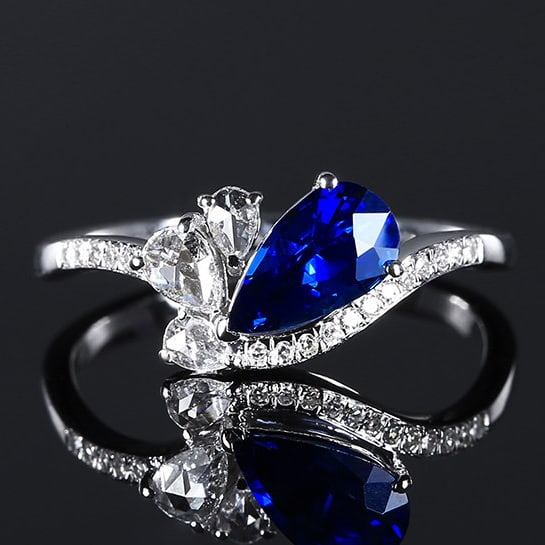 14k Gold 1.23 Ctw Natural Sapphire & Diamond Ring: Ref:231150248 // gold content:14k gold // ring size:7. 25us // // main gemstone:sapphire // shape:pear // carat weight:1. 00ct // color:blue // treatment:natural // // adjacent gemstone 2 : diamond //