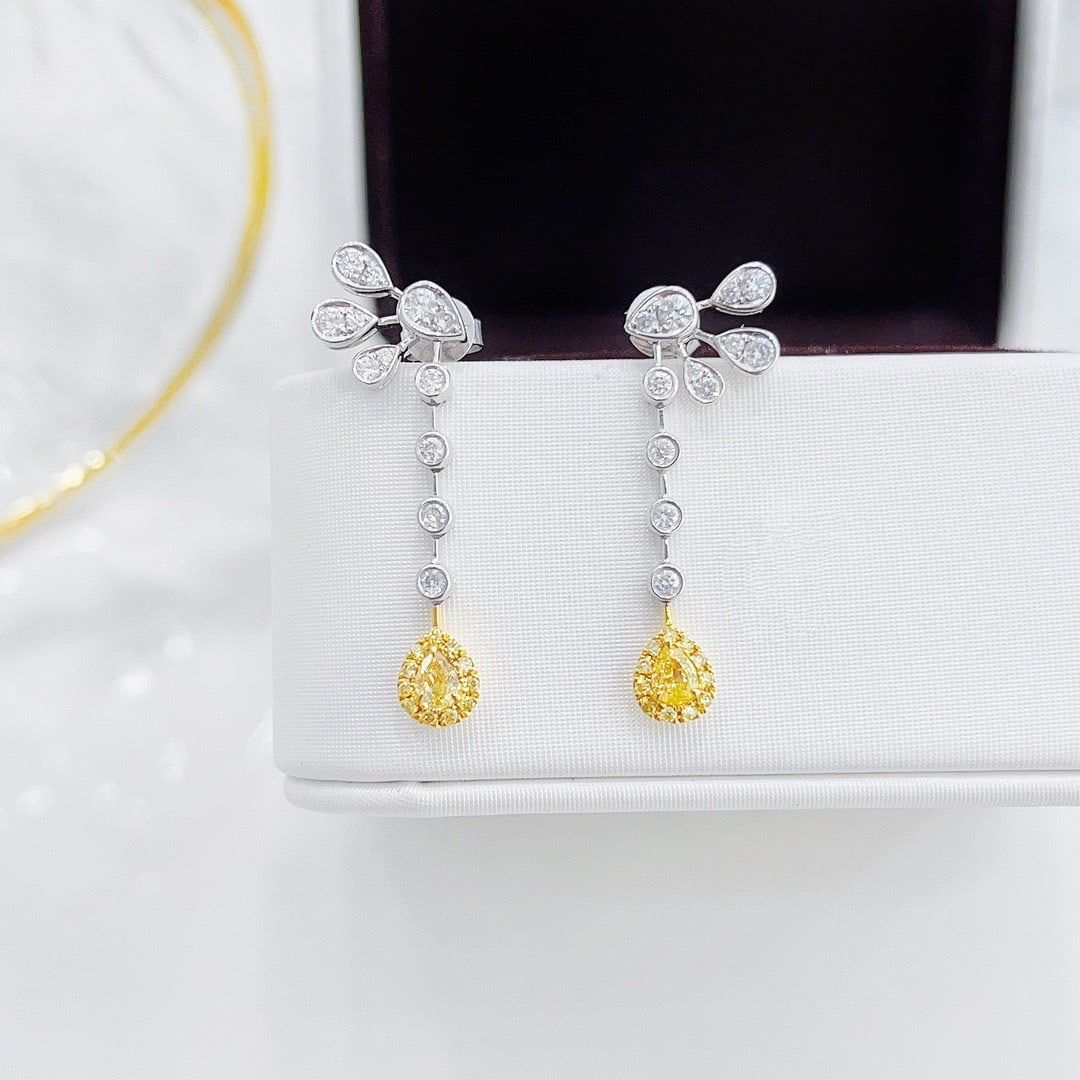 14k Gold 0.68 Ctw Natural Yellow Diamond & Diamond Earrings: Ref:231150305 // gold content:14k gold // main gemstone:yellow diamond // shape:pear // carat weight:0. 22ct // color:yellow // treatment:natural // // adjacent gemstone 2 : diamond // shape:round //