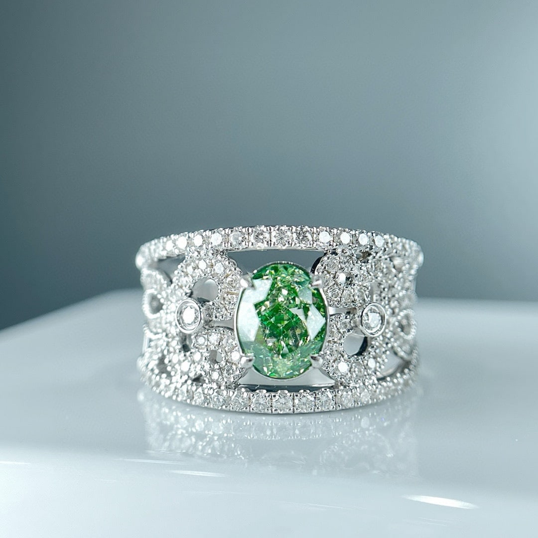 14k Gold 1.51 Ctw Natural Green Diamond & Diamond Ring: Ref:231150313 // gold content:14k gold // ring size:7. 25us // // main gemstone:green diamond // shape:oval // carat weight:1. 01ct // color:green // treatment:natural // // adjacent gemstone 2 :
