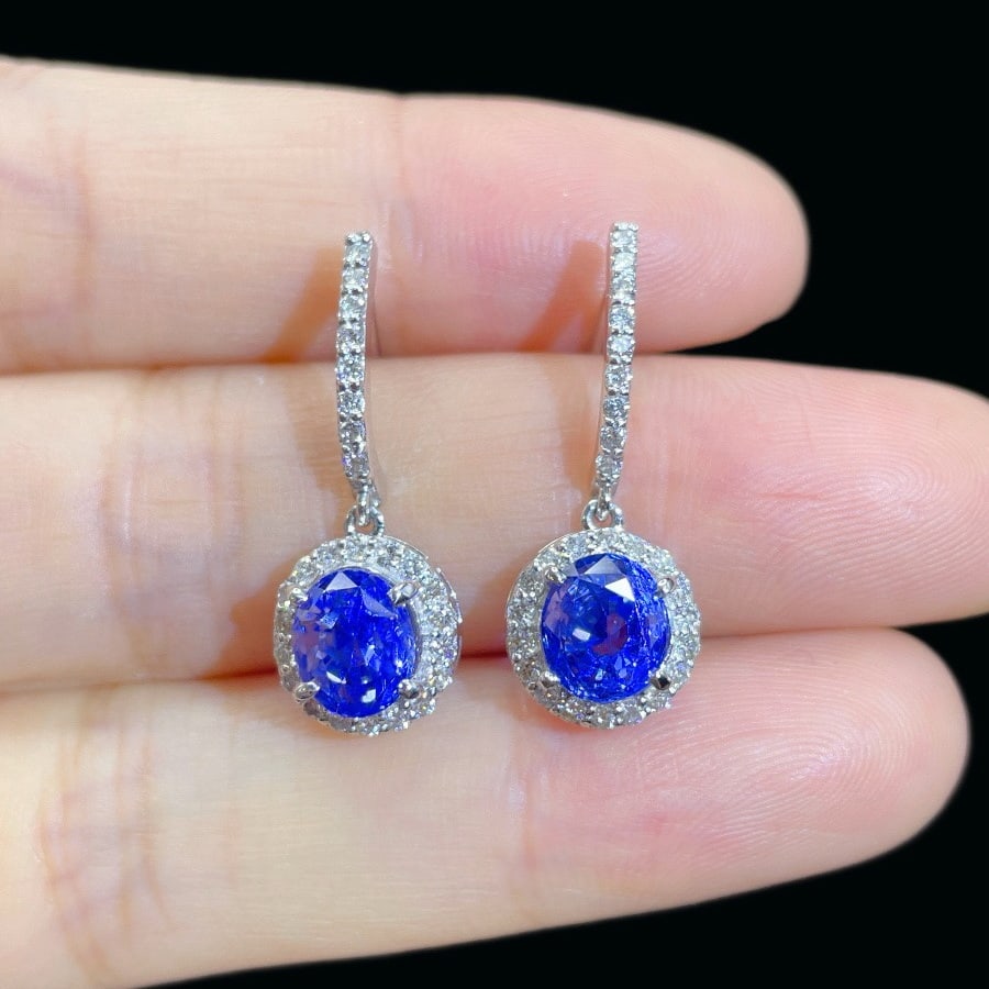 14k Gold 2.15 Ctw Natural Sapphire & Diamond Earrings: Ref:231150408 // gold content:14k gold // main gemstone:sapphire // shape:oval // carat weight:1. 63ct // color:blue // treatment:natural // // adjacent gemstone 2 : diamond // shape:round // carat we